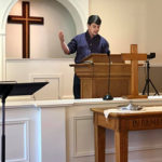 Brandon preaching sermon at Pathfinders